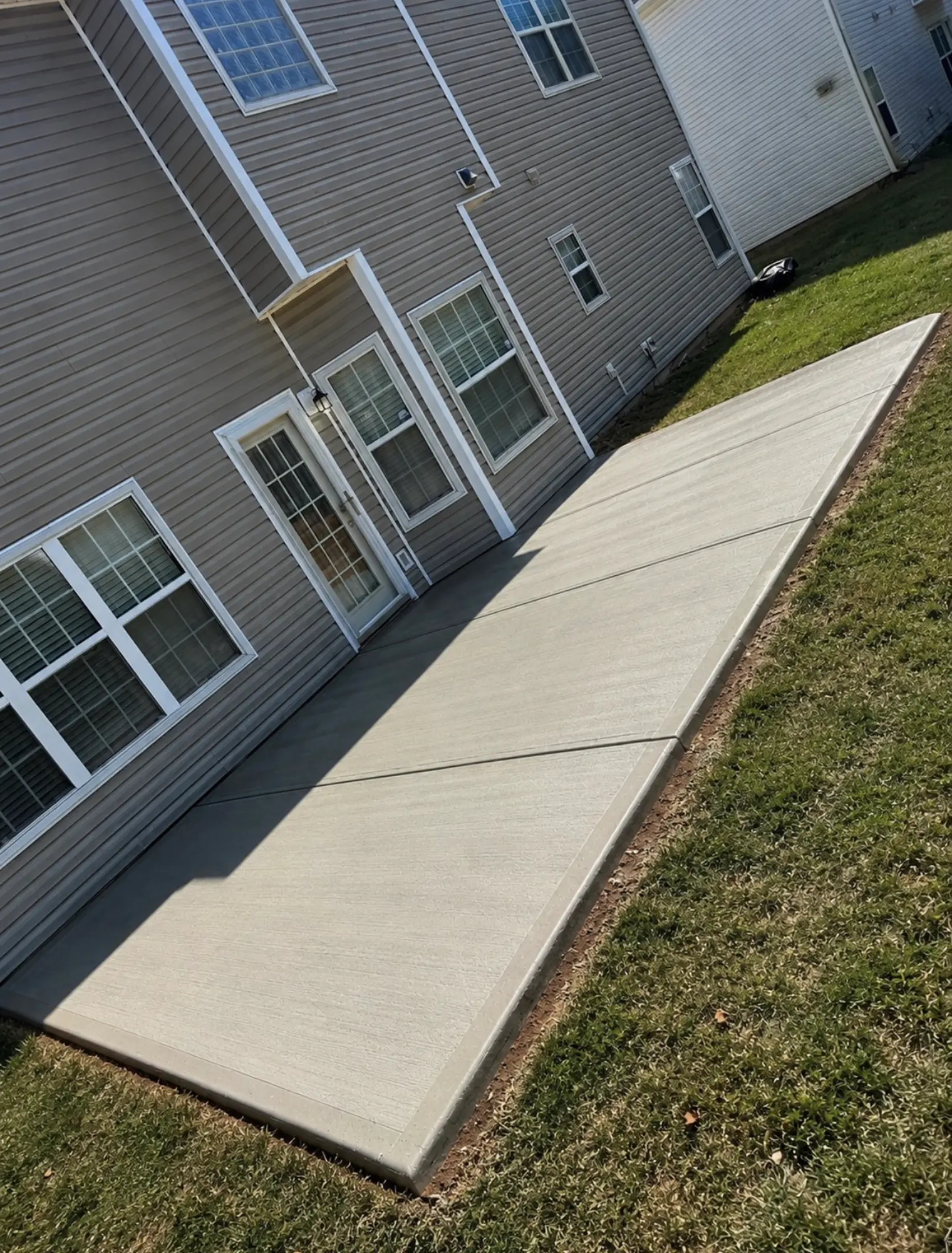 Residential driveway concrete work by Mind & Vision Construction