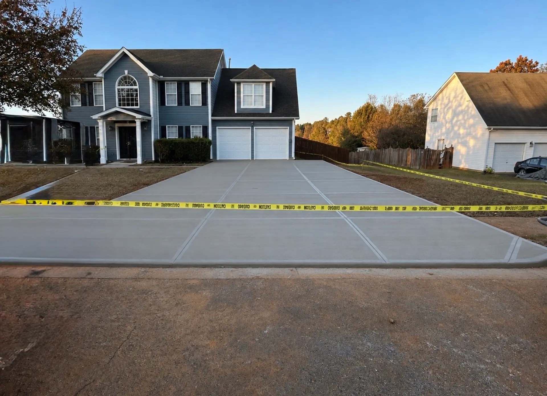 Backyard concrete patio installation by Mind & Vision Construction