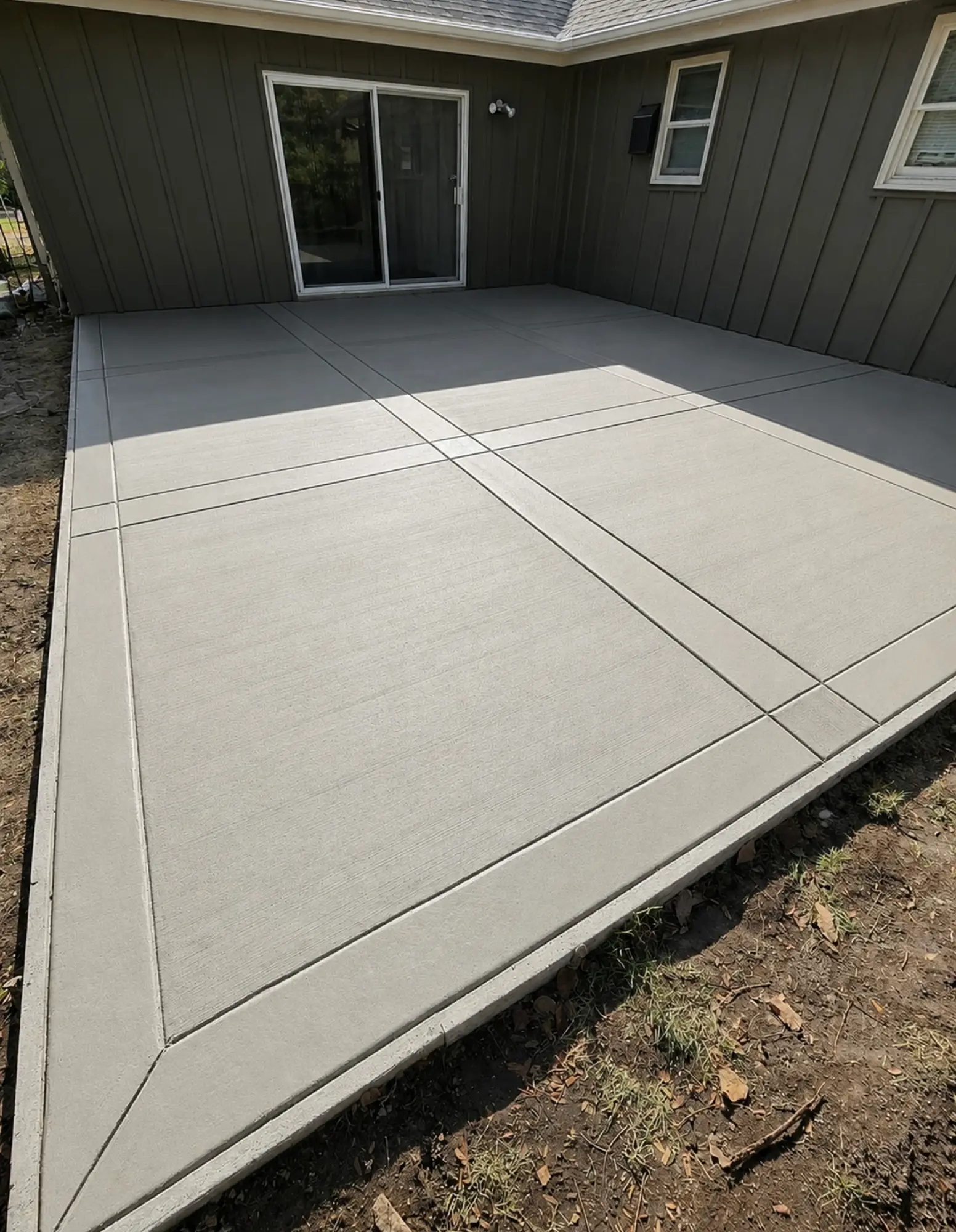 Finished concrete patio by Mind & Vision Construction